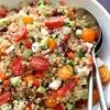 Put couscous in a medium bowl and stir in tomatoes and basil. 1