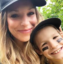 Softball unites football rivals