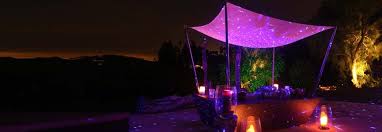 Bliss Lights Projecting On A Tent At An Event The Pink Glow Is From The Blisslights Accent Led Light Blisslights Light Project Led Lights