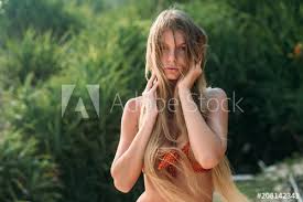 Stream tracks and playlists from young puffy on your desktop or mobile device. Travel Wildlife Leisure Lifestyle Concept Young Beautiful Female Model Posing On Camera In Red Stylish Swimsuit