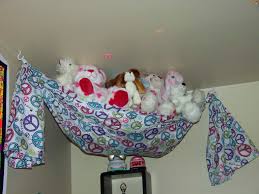 My Tween Daughter Isn T Ready To Get Rid Of Her Stuffed Animals But Doesn T Play With Them We Decided To Showcase Stuffed Animal Storage Kids Room Kids Room