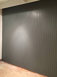 A beadboard wall, made from wooden routed paneling, provides texture and depth. New Laundry Room Beadboard Wall Paint Lighting