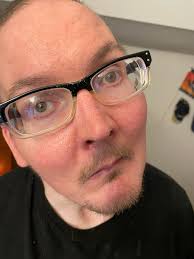 Why does Chris's hair keep changing its length in Northern Exposure?