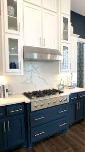 The shaker profile of the cupboards lend a classic look to the space, with gold tapware pairing beautifully with the statement ross gardam pendant lights. 200 Blue Kitchens Ideas Blue Kitchens Kitchen Design Blue Kitchen Cabinets