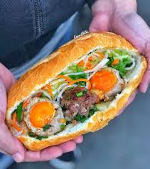 Paté and margarine are spread swiftly across the soft, chewy interior of a baguette and later, the sandwich is loaded with pickled vegetables, fresh cilantro, pork belly, pork floss and cucumber. Google Ton Vinh Banh Mi Viá»‡t Nam Báº±ng Biá»ƒu TÆ°á»£ng Doodles