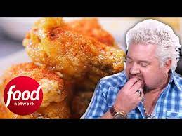 Guy Fieri Tries An American Asian Mix Szechuan Parmesan Chicken Wings Diners Drive Ins Dives Youtube