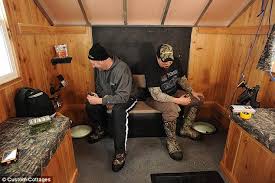 Multiple velcro openings for easy access to the ice. Ice Fishing Is Easy In These Decked Out Campers With Heat Kitchens Daily Mail Online