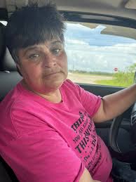 This is a red face of a fat chick that just walked 3 miles searching for  the two small dogs someone dumped at the dump