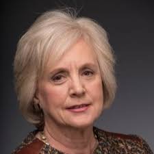 His colleagues describe him as a “game show host trapped in a professor's  body.”