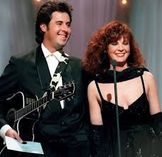 In 1999, Vince Gill and Patty Loveless took the stage for a breathtaking  performance of My Kind of Woman/My Kind of Man, a duet that showcased the  depth and sincerity of country