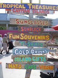You Ll Find Many Tourist Friendly Shops In Cayman To Purchase Essentials Like Sunglasses Souvenirs And Sun Awesome Islands Island Vacation British West Indies
