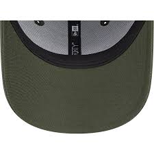 Justerbar grön 9FORTY böjd keps från Sylvester Looney Tunes av New Era:  Caphunters.com