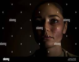 U.S. Air Force Tech. Sgt. Megan Lundgren, 52nd Air Mobility Squadron unit  training manager, poses for a portrait while wearing moulage makeup at  Spangdahlem Air Base, Germany, Oct. 17, 2018. Lundgren volunteered