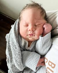 My beautiful sister gave birth to her 7th baby this weekend, Oaks Michael  Blanton. He is precious and perfect, with a head full of hair, parents who  are crazy about him, and