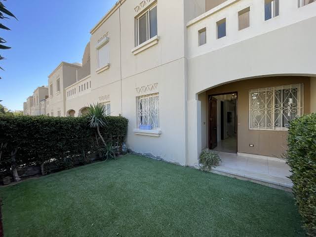 The lush private garden of your Makadi Bay apartment, AI generated