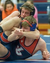 Two athletes on the wrestling mat. Takeaways From Klaa S Championship Wrestling Quad