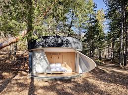 Lumipod Cabin S Curved Glazed Facade Immerses Visitors In Nature Prefab Prefabricated Houses Prefab Buildings