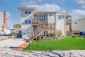 Welcome to this one-of-a-kind Oasis! 🌊 49 Stirling Avenue, Freeport, NY  11520 📍 This Split Level Home features vaulted ceilings and three bright  and spacious levels to live life