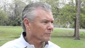 Murders bruise small town's football champions