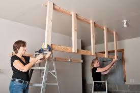 Installing overhead garage storage yourself is a luring option. How To Install Overhead Garage Storage Diy Stanley Tools