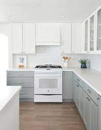 Kitchen cabinets gray bottom white top. Kitchen With White Top Cabinets And Gray Bottom Cabinets Transitional Kitchen Kitchen Cabinets Grey And White New Kitchen Cabinets Kitchen Renovation