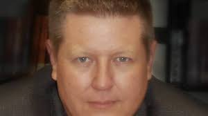 Olathe Northwest High debate coach Josh Anderson is a national champion