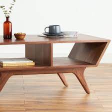 This midcentury modern coffee table is designed by los angeles base interior designer and features a spherical form cut in half. Mid Century Modern Coffee Tables Joybird