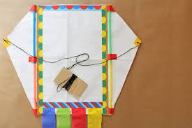 How to make a kite. How To Make A Kite Out Of Recycled Mailers Babble Dabble Do