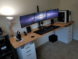 This is the working desk of john & sherry petersik, who run a home improvement website called younghouselove.com. The Triple Monitor Dual Desk Workspace Home Office Setup Desks For Small Spaces Game Room Design