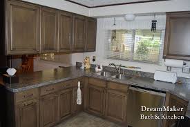 These are becoming a popular style choice alongside concrete or marble for the grey kitchen. Gray Laminate Countertops With Ashy Brown Cabinets Great Combination Kitchen Remodel Brown Cabinets Gray Laminate Countertops