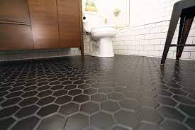Before After A Light And Bright Tudor Remodel Black Bathroom Black Tile Bathrooms Rustic Bathroom Vanities