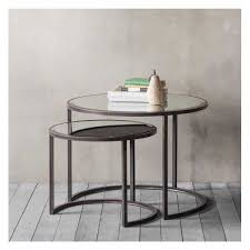 Luxury round glass and metal coffee table, source: Stylish Glass Metal Round Nest Of 2 Coffee Tables Black Metal Base 80cm Diameter