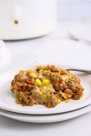 Easy cornbread casserole with a layer of cornbread as the base, a mixture of spices with organic grass fed ground beef and another layer of cheesy cornbread. Easy Crockpot Mexican Casserole To Simply Inspire