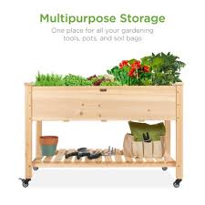 You create raised garden beds by building a large container and filling it with soil, compost, and aerating materials. Raised Garden Beds Target