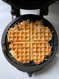 Toss potatoes with salt, pepper, garlic powder, and onion powder. I Tried Ina Garten S Waffle Iron Hash Browns Kitchn