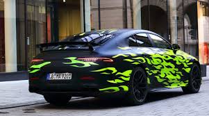 Four Door Mercedes Amg Gt Wearing Green Flames Mercedes Benz Mercedes Amg Mercedes
