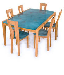 Looking for dining room furniture online in india? The Glass For The Antigua Series Is Made Using A Patented Process Perfected By Seltz That Combines Coppe Dining Table Florida Furniture Glass Top Dining Table