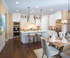 The Enclave On Collier By Jw Collection White Cabinetry Kitchen Remodel Dark Wood Floors
