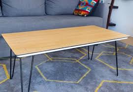 Frustrating coffee table made out of 55 wooden jigsaw puzzle pieces created for people who think that ikea furniture is too easy to assemble. Jigsaw Puzzle Coffee Table