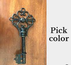 The picture frames are the integral part of the wall decor and styling and now they can serve you another fun purpose to add functionality to your entrance walls and that is the role of key holder. Large Skeleton Key Wall Decor Large Metal Key Pick Color Large Etsy Key Wall Decor Well Decor Wall Hanging
