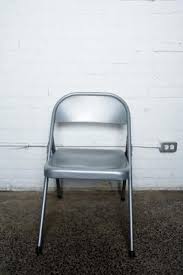 How To Make Super Cute Seat Cushions For Folding Chairs Hunker Metal Folding Chairs Folding Chair Makeover Folding Chair