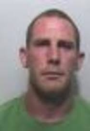 Jail for dad who kept sawn-off shotgun and revolver in his kitchen