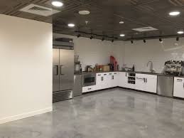 Self Leveling Cement Installed Over Ceramic Tiles In A Office Cafetaria Concrete Floors Concrete Overlay Flooring