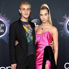 By natasha hooper for mailonline. Dua Lipa Anwar Hadid Make Red Carpet Debut At The 2019 Amas E Online