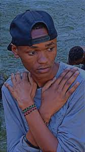 FRED “”GASO”” MUKASA IN ACTION FOR EXPRESS FC (in red) and in action for  UGANDA CRANES (in yellow) that was in early 1980s The same FRED MUKASA is  now a business man