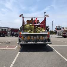 Hose Tender! These rigs are kept in various stations in SF. They would be  put in service if our hydrant system was compromised. They have 5” hose and  “portable hydrants”. In a