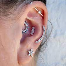 101 Piercing Bvla Is On Instagram Gem Kolo Daith Marquise Panaraya Conch Cumulus Helix White And Ocean B Ear Piercings Blue Diamond Tattoos And Piercings