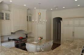 Media Cache Ak0 Pinimg Com 736x 13 Dd 7c 13dd7ca0c7ad1f3ddad8a26aa4ded19a Jpg Manchester Tan Tan Kitchen Walls Tan Kitchen Cabinets