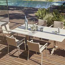 An outdoor table top can feature intricate patterns and designs, such as woven, mesh, or floral patterns. Roberti Key West Outdoor Dining Table Chair Homeinfatuation Com
