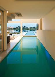 These creatively designed indoor swimming pools connect to nature and allow you to enjoy the outdoors no matter what the weather. Amazing Swimming Pools Homeadore Indoor Pool Design Indoor Outdoor Pool Amazing Swimming Pools